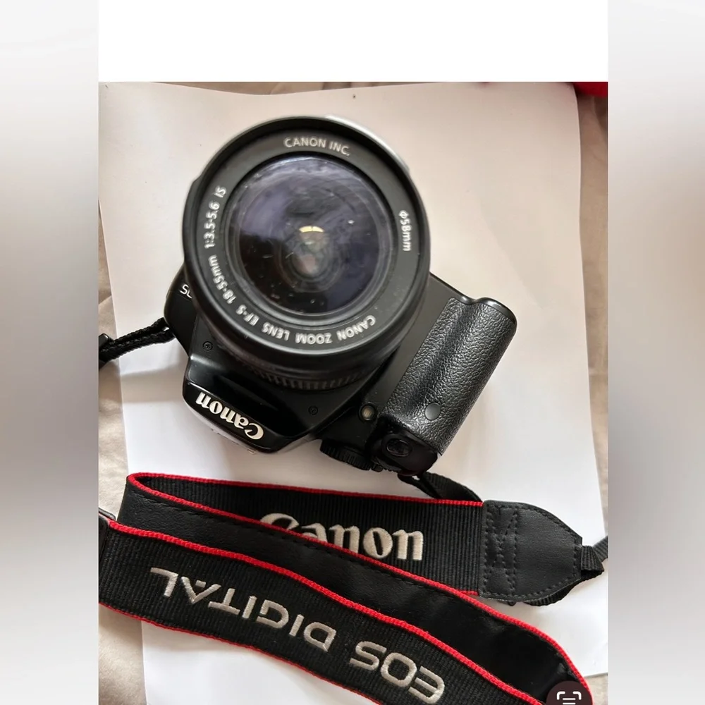 Canon EOS Rebel sxi Camera comes with only as shown in photos